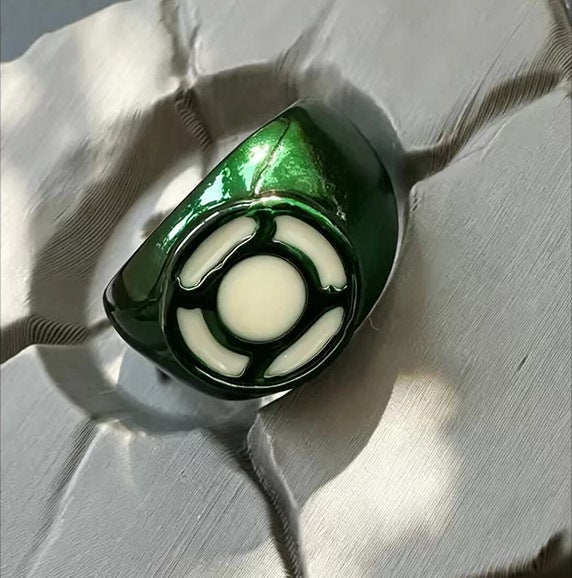 Classic ring emblem and green finish detail