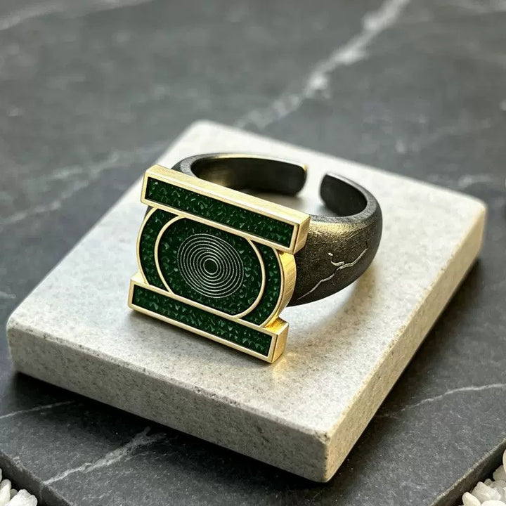 Angled view showing the open band and green emblem